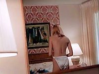 Natasha Henstridge stripping scene. She was in the bedroom showing off her naked round breast, choosing and trying to fit a bra in front of a mirror showcasing her beautiful body and just wearing a tiny white panties in this movie.